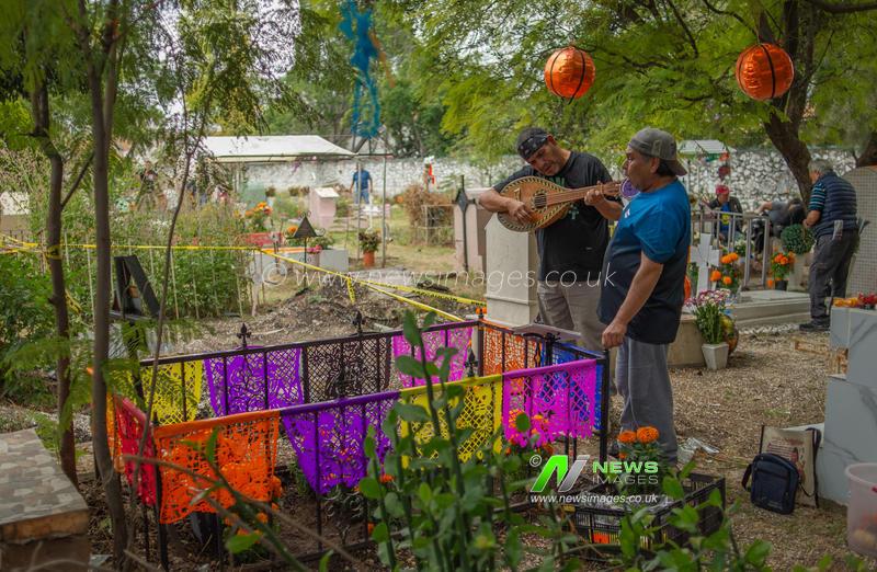 Mexico: People Visit Cemeteries on the Day of the Dead