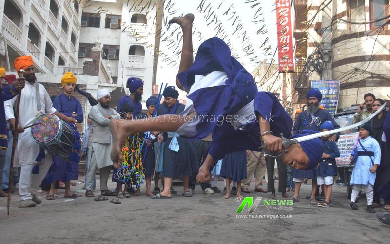 India: Devotees Take Out Religous Procession At Golden Temple On Eve Of 350th Martyrdom Day Of Guru Tegh Bahadur