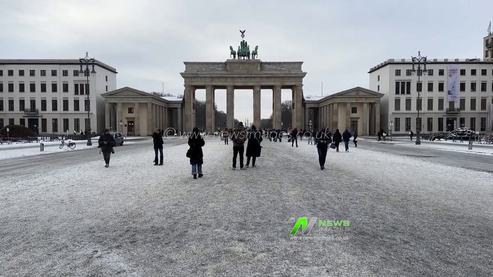 Germany: Winter weather grips Berlin as snow covers the Brandenburg Gate