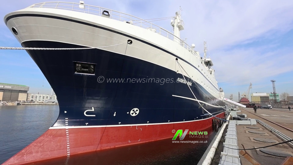 Russia: Flag raising ceremony aboard Russian fishing trawler Kapitan Yunak