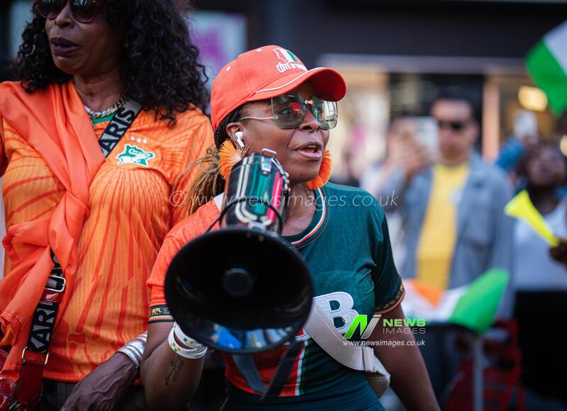 NY: People From Cote d'lvoire In Times Square. 