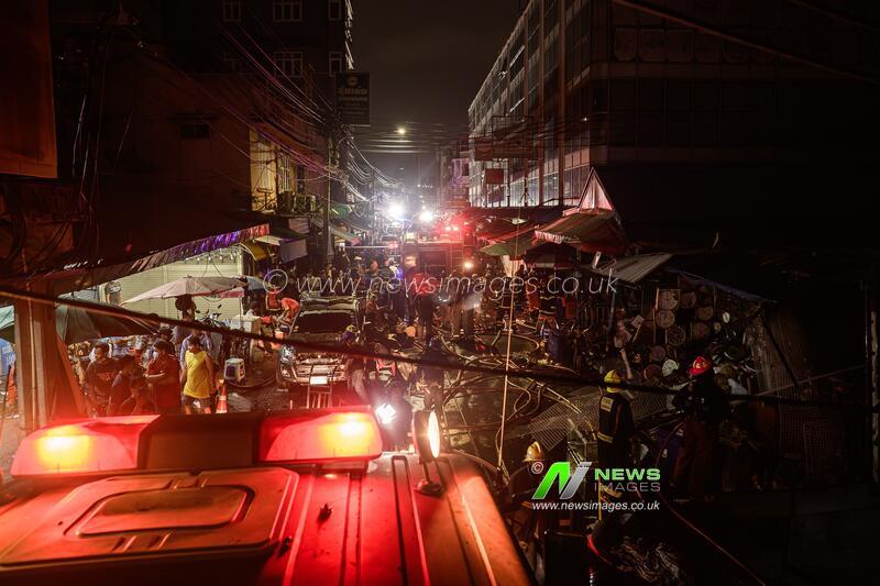 Firefighters battle blaze at major electronics market in Bangkok