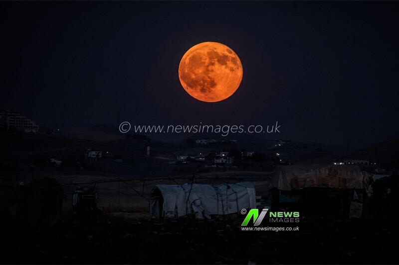 Full moon rises over Erbil
