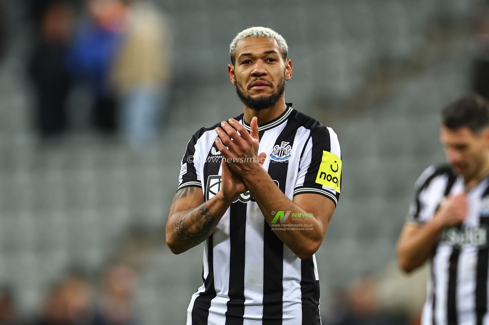 Joelinton #7 of Newcastle United applauds the fans after Newcastle lose 1-2 during the UEFA Champions League match Newcastle United vs AC Milan at St. James's Park, Newcastle, United Kingdom, 13th December 2023

(Photo by Mark Cosgrove/News Images)