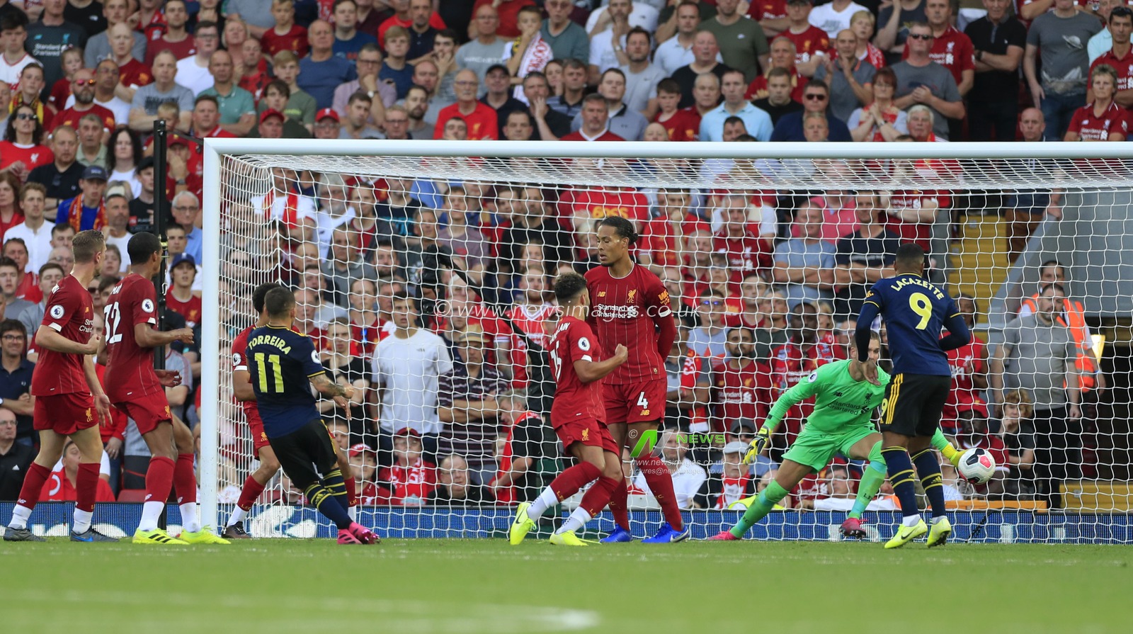 23rd August 2019 , Anfield, Liverpool, England; Premier League Football, Liverpool vs Arsenal ;   Lucas Torreira (11) of Arsenal scores in the 84th minute, 3-1 to Liverpool

Credit: Conor Molloy/News Images 


Premier League/EFL Football images are subject to DataCo Licence