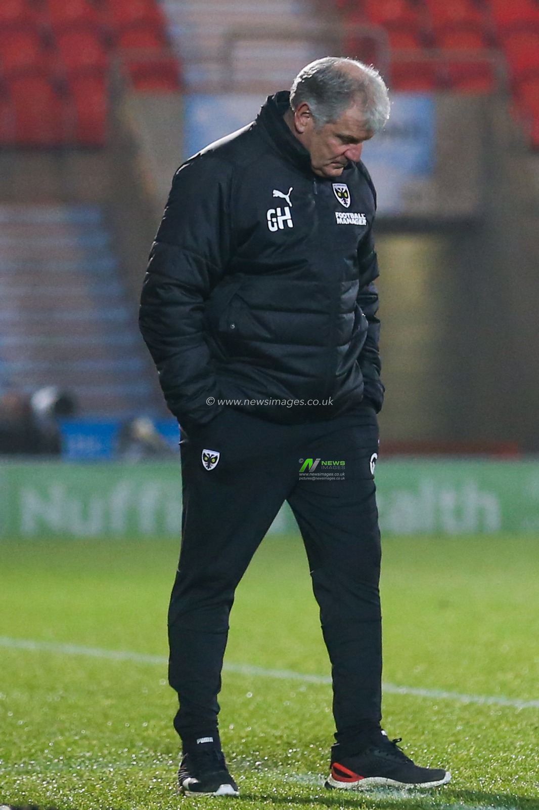 Glyn Hodges manager of AFC Wimbledon reacts during the game