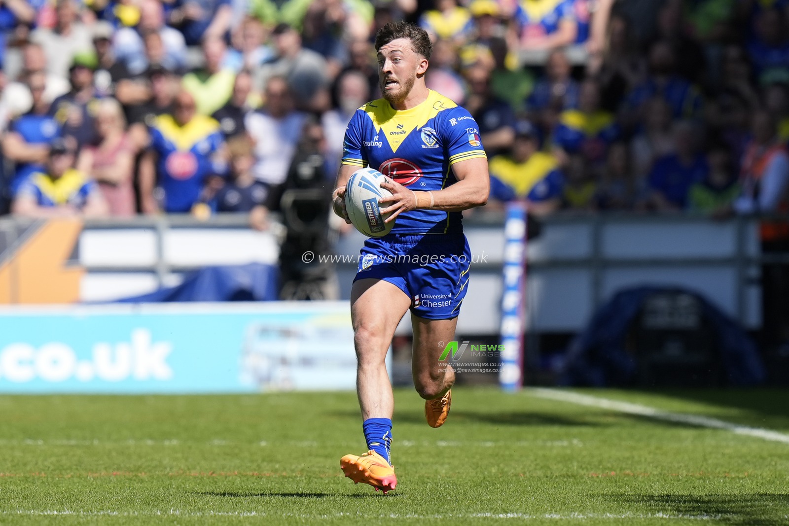 Matty Ashton of Warrington Wolves makes a break during the Betfred Challenge Cup Semi-Final match Huddersfield Giants vs Warrington Wolves at Totally Wicked Stadium, St Helens, United Kingdom, 19th May 2024

(Photo by Steve Flynn/News Images)