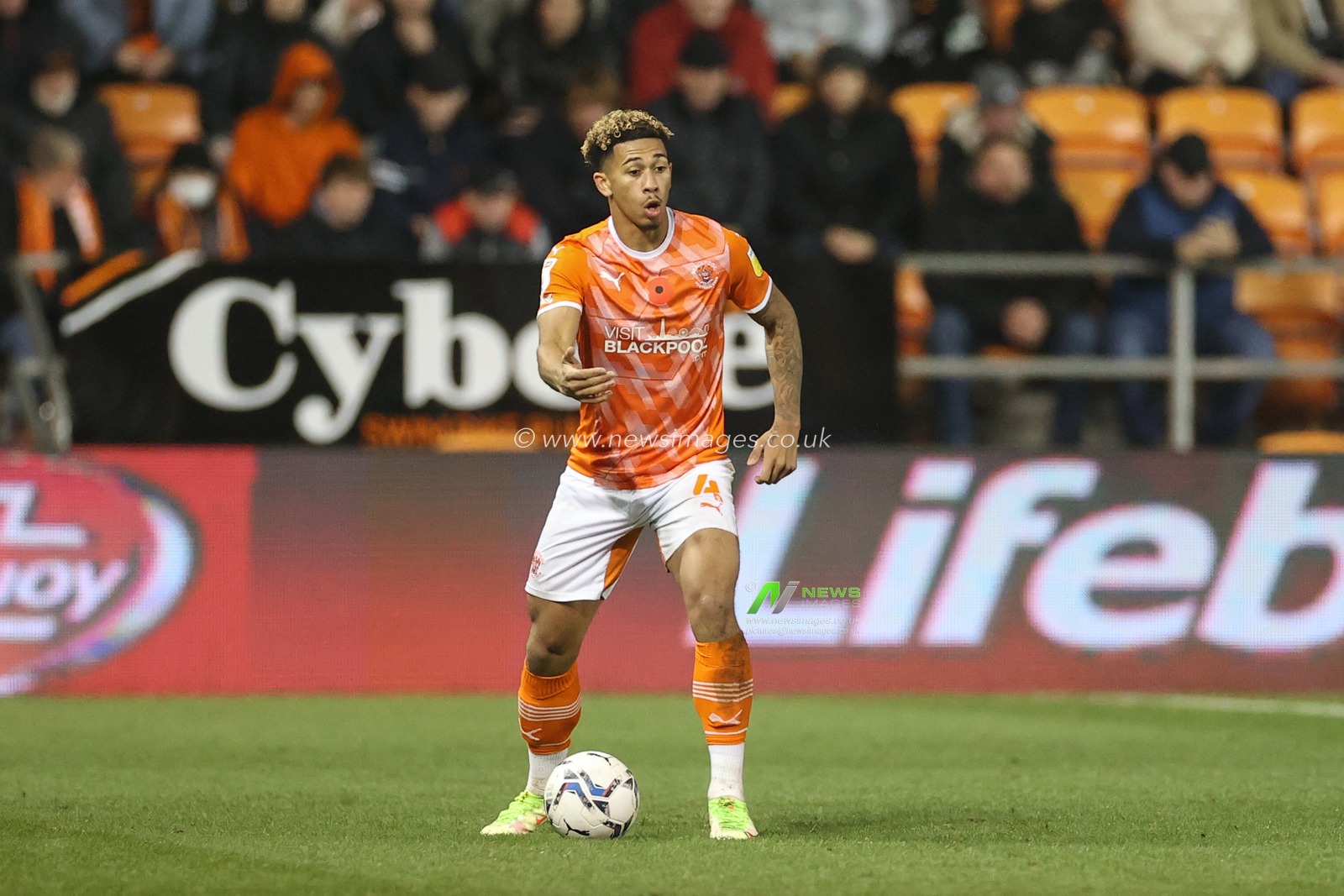 Jordan Gabriel #4 of Blackpool looks for assistance