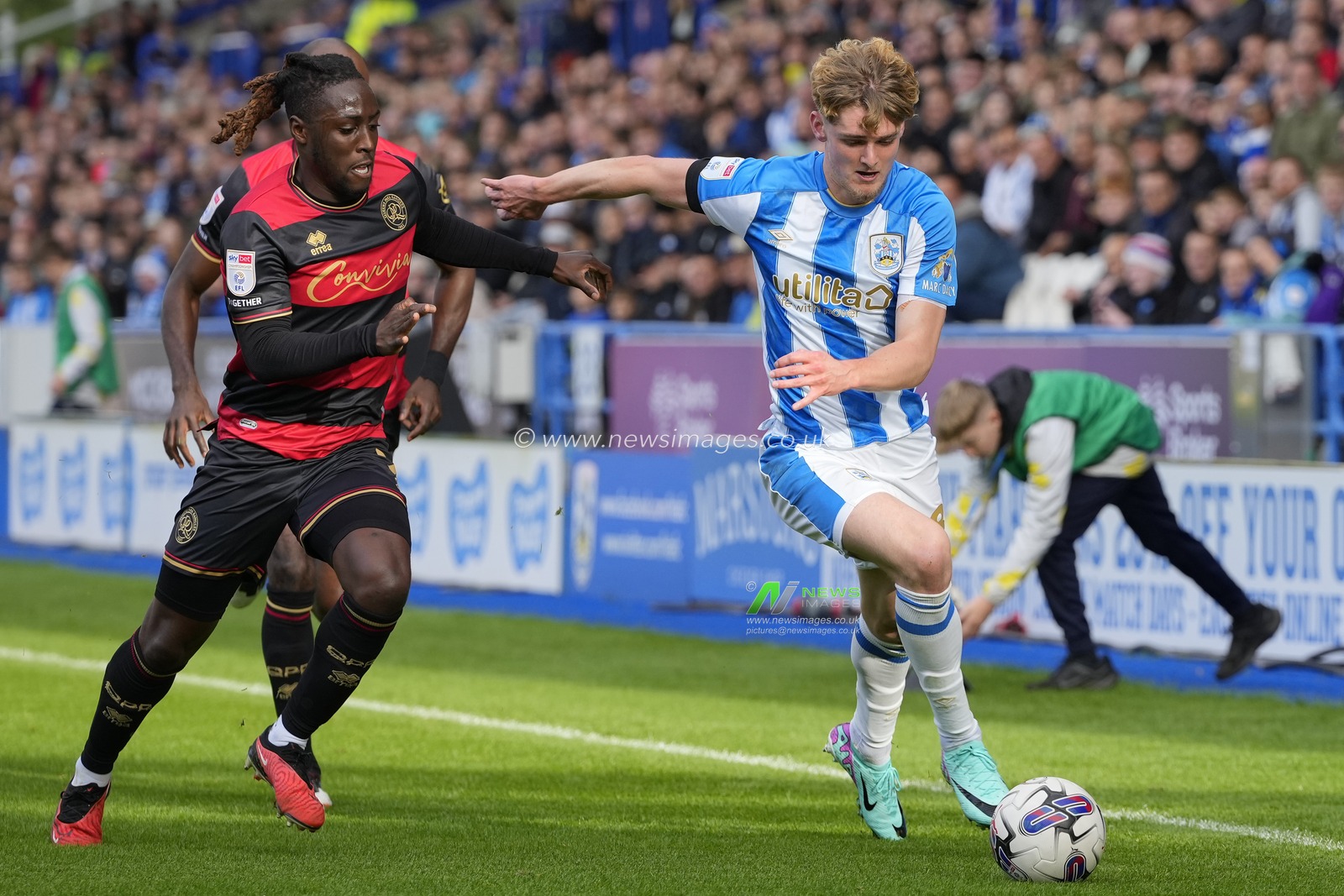 Osman Kakay #2 of Queens Park Rangers competes for the ball with Jack Rudoni #8 of Huddersfield Town during the Sky Bet Championship match Huddersfield Town vs Queens Park Rangers at John Smith's Stadium, Huddersfield, United Kingdom, 21st October 2023

(Photo by Steve Flynn/News Images)