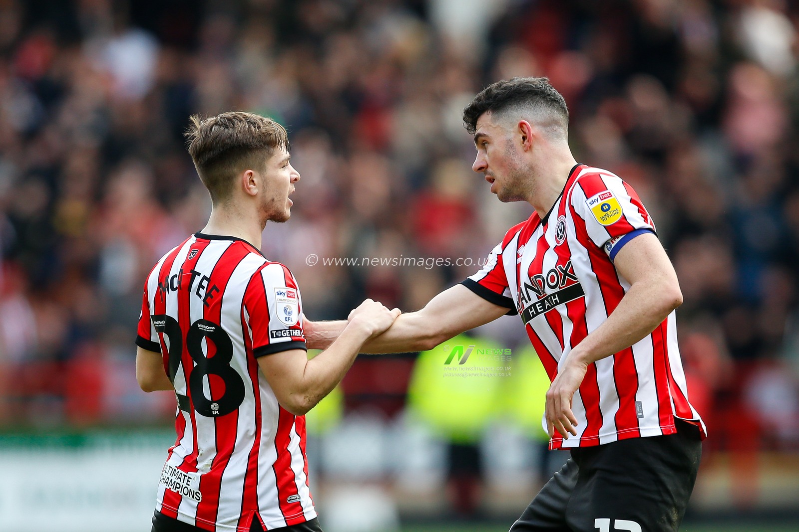 James McAtee #28 of Sheffield United and John Egan #12 of Sheffield United during the Sky Bet Championship match Sheffield United vs Cardiff City at Bramall Lane, Sheffield, United Kingdom, 15th April 2023

(Photo by Ben Early/News Images)