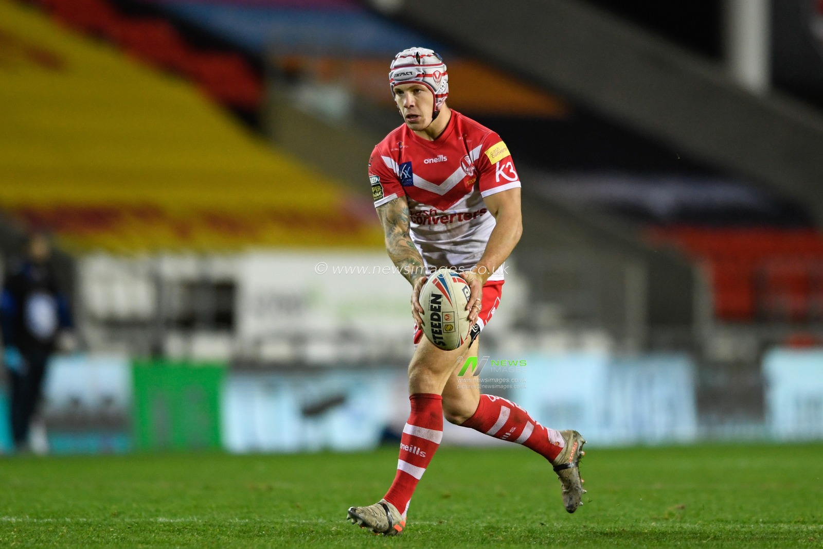 Theo Fages (7) of St Helens runs forward with the ball
