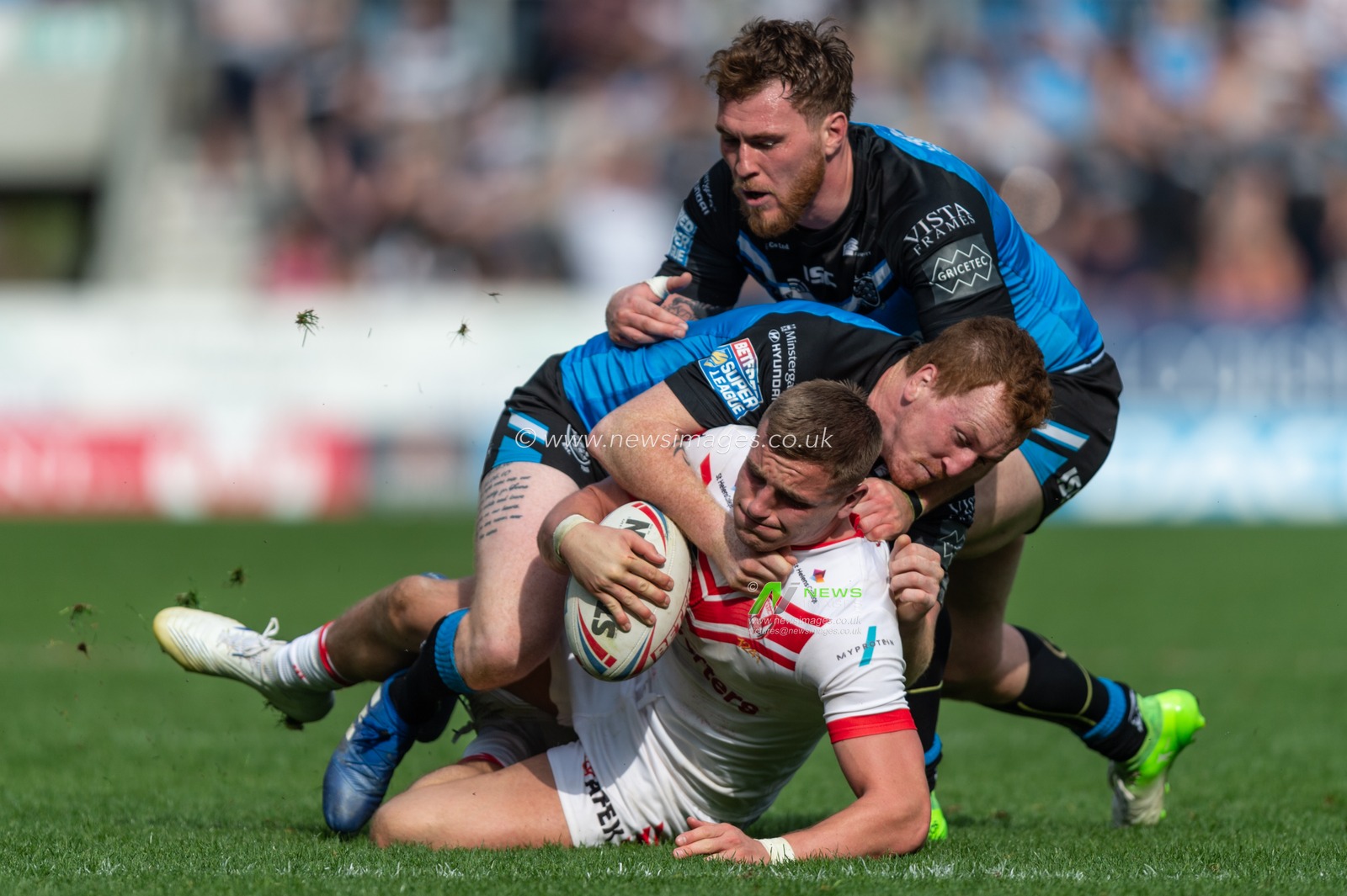 22nd April 2019 , Totally Wicked Stadium, St Helens, England;  Betfred Super League, Round 12, St Helens vs Hull FC, Matty Lees of St Helens is tackled

Credit: Richard Long/News Images