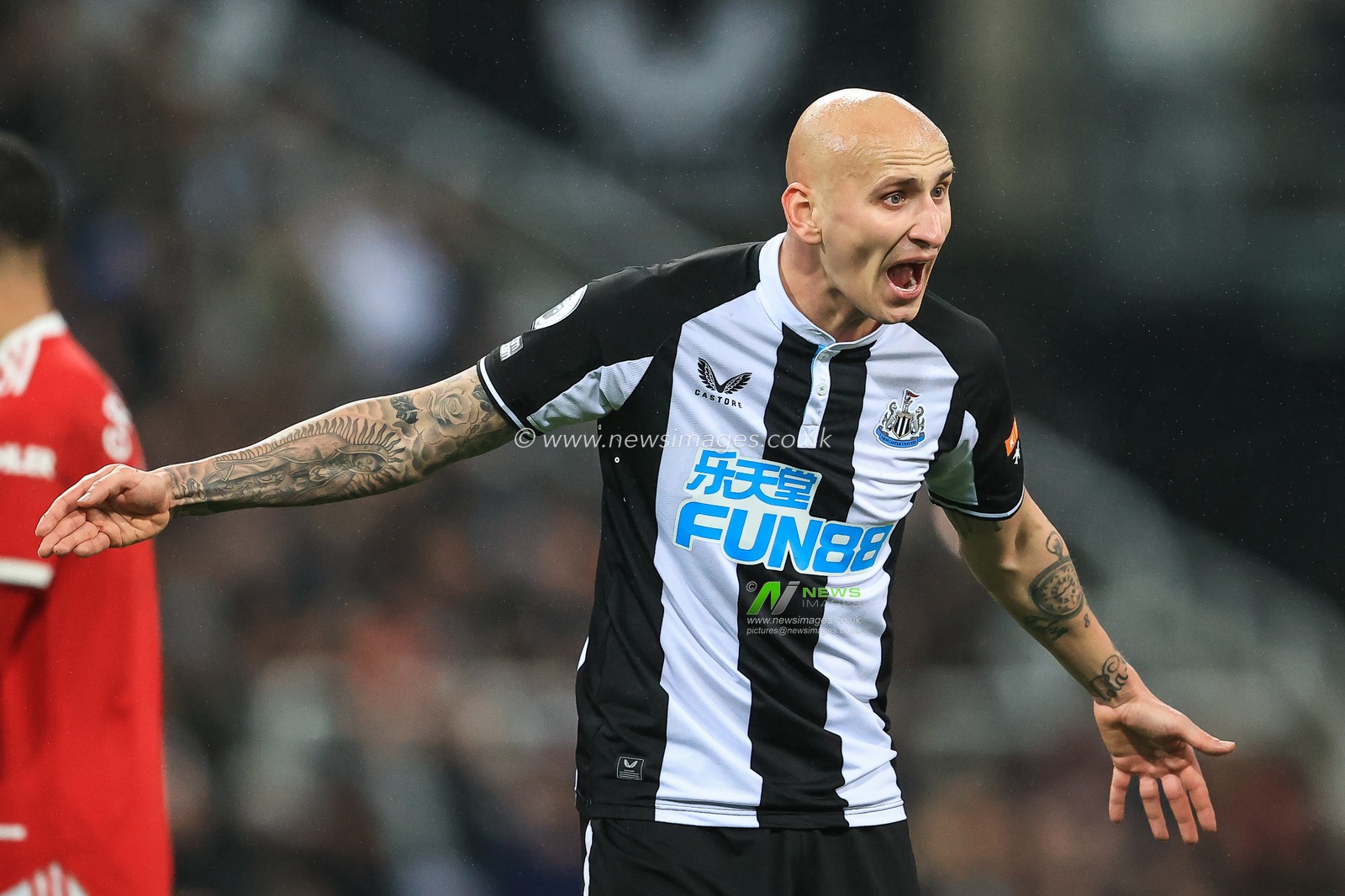 Jonjo Shelvey #8 of Newcastle United reacts to Referee Craig Pawson decision