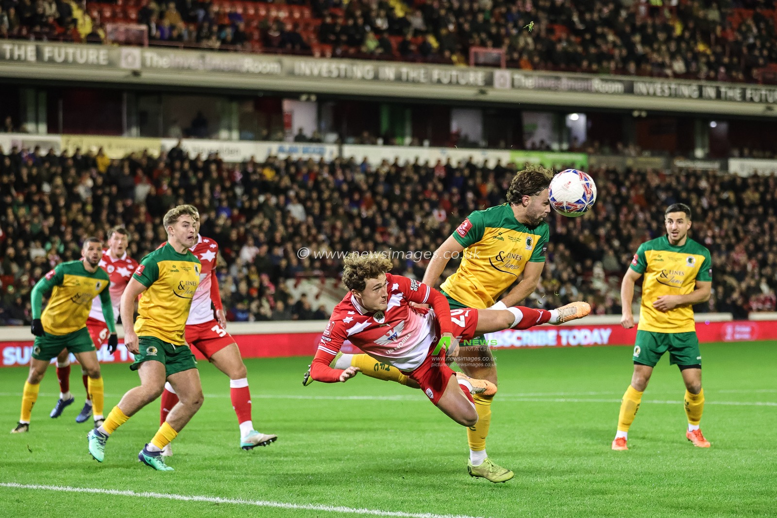 Callum Styles #20 of Barnsley and Lee Harding of Horsham battle for the ball during the Emirates FA Cup 1st Round match Barnsley vs Horsham FC at Oakwell, Barnsley, United Kingdom, 3rd November 2023

(Photo by Mark Cosgrove/News Images)