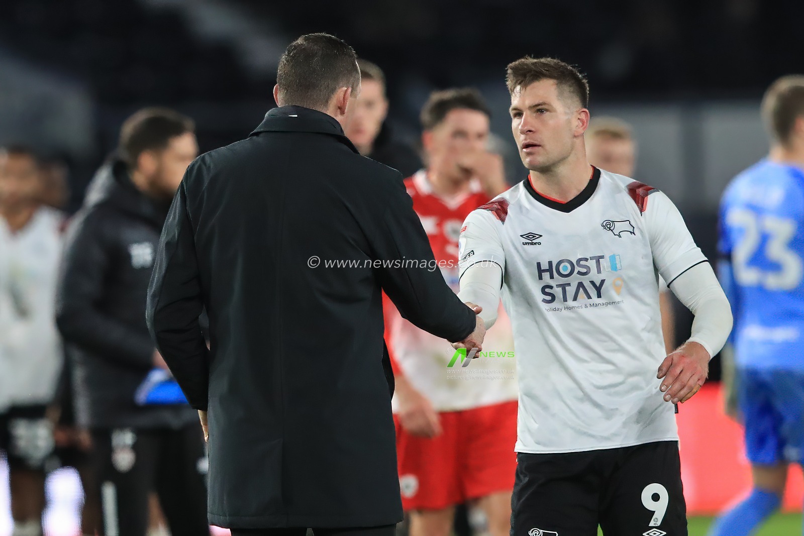 Neill Collins Head coach of Barnsley shakes hands with James Collins #9 of Derby County after the game during the Sky Bet League 1 match Derby County vs Barnsley at Pride Park Stadium, Derby, United Kingdom, 11th November 2023

(Photo by Alfie Cosgrove/News Images)