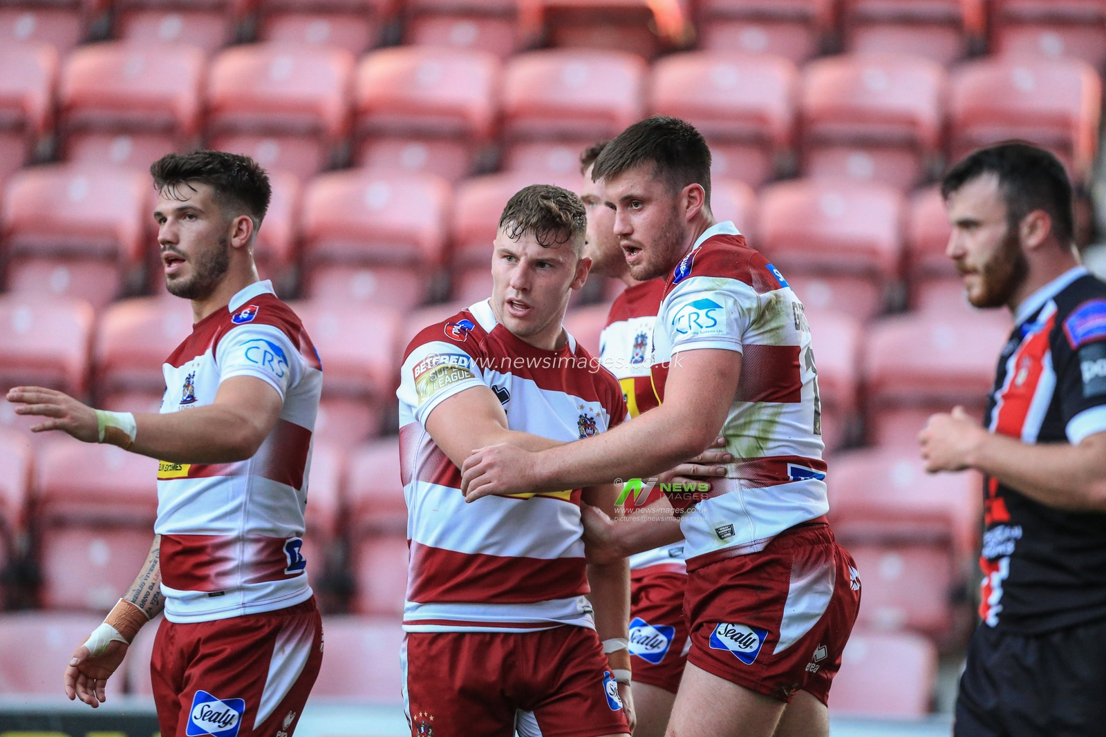 28th June 2019 , DW Stadium, Wigan, England;  Betfred Super League, Round 20, Wigan Warriors vs Salford Red Devils ; Joe Greenwood (11) of Wigan Warriors celebrates his try 

Credit: Mark Cosgrove/News Images