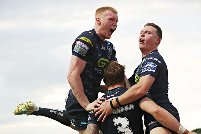 Adam Keighran of Wigan Warriors celebrates his try with Zach Eckersley of Wigan Warriors and Jai Field of Wigan Warriors during the Betfred Super League round 15 match Wakefield Trinity vs Wigan Warriors at DIY Kitchens Stadium, Wakefield, United Kingdom, 20th June 2025

(Photo by Sam Eaden/News Images)