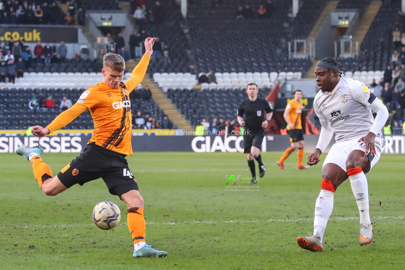 Marcus Forss #44 of Hull City takes a shot on goal which is finished by Tom Eaves #9 of Hull City