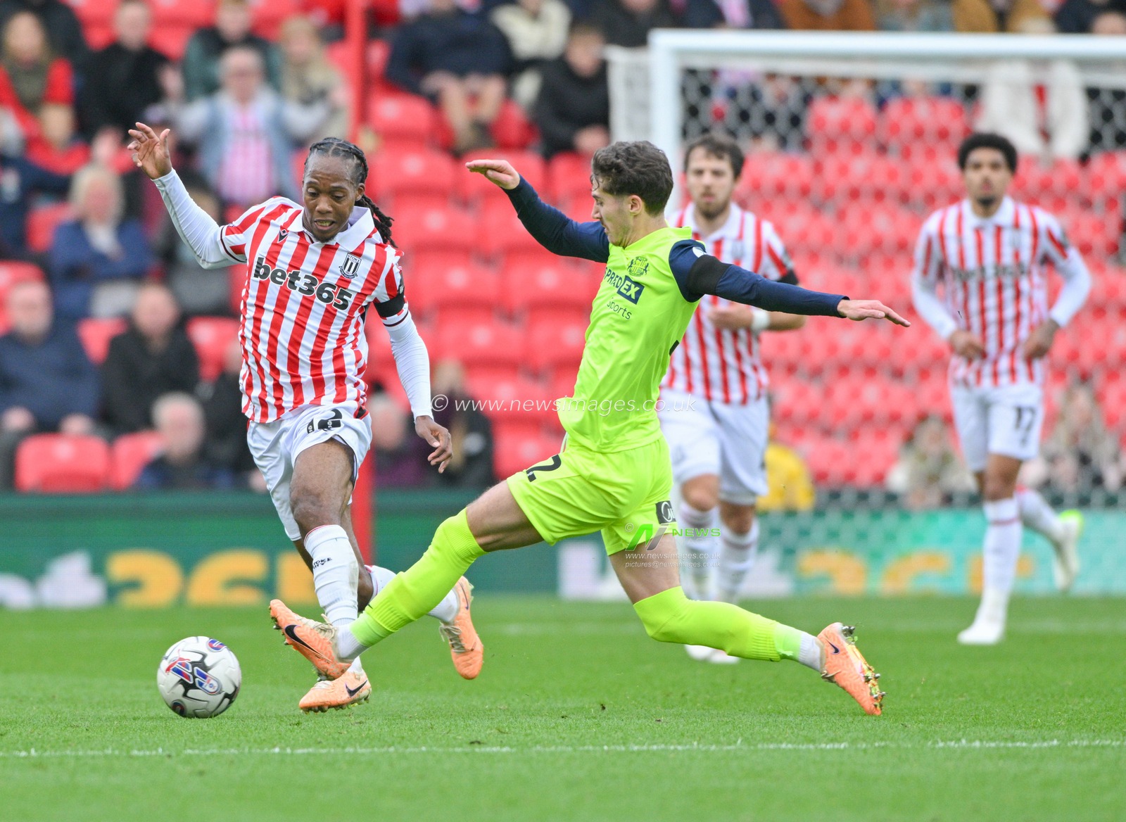 Daniel Johnson 12# of Stoke City Football Club and Trai Hume 32# of Sunderland Association Football Club battle for the ball, during the Sky Bet Championship match Stoke City vs Sunderland at Bet365 Stadium, Stoke-on-Trent, United Kingdom, 21st October 2023

(Photo by Cody Froggatt/News Images)