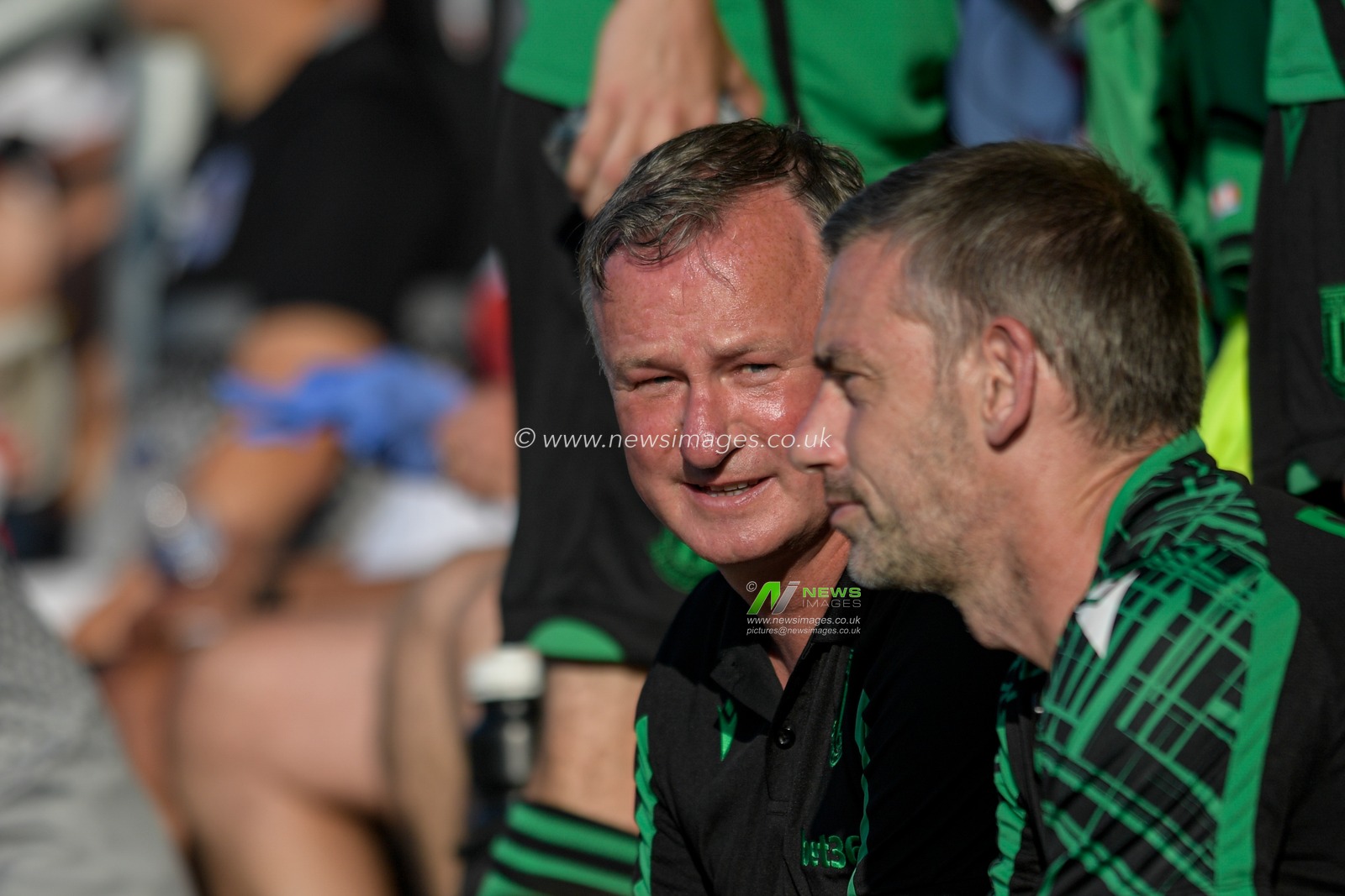 Michael O'Neill manager of Stoke City takes his seat in the technical area