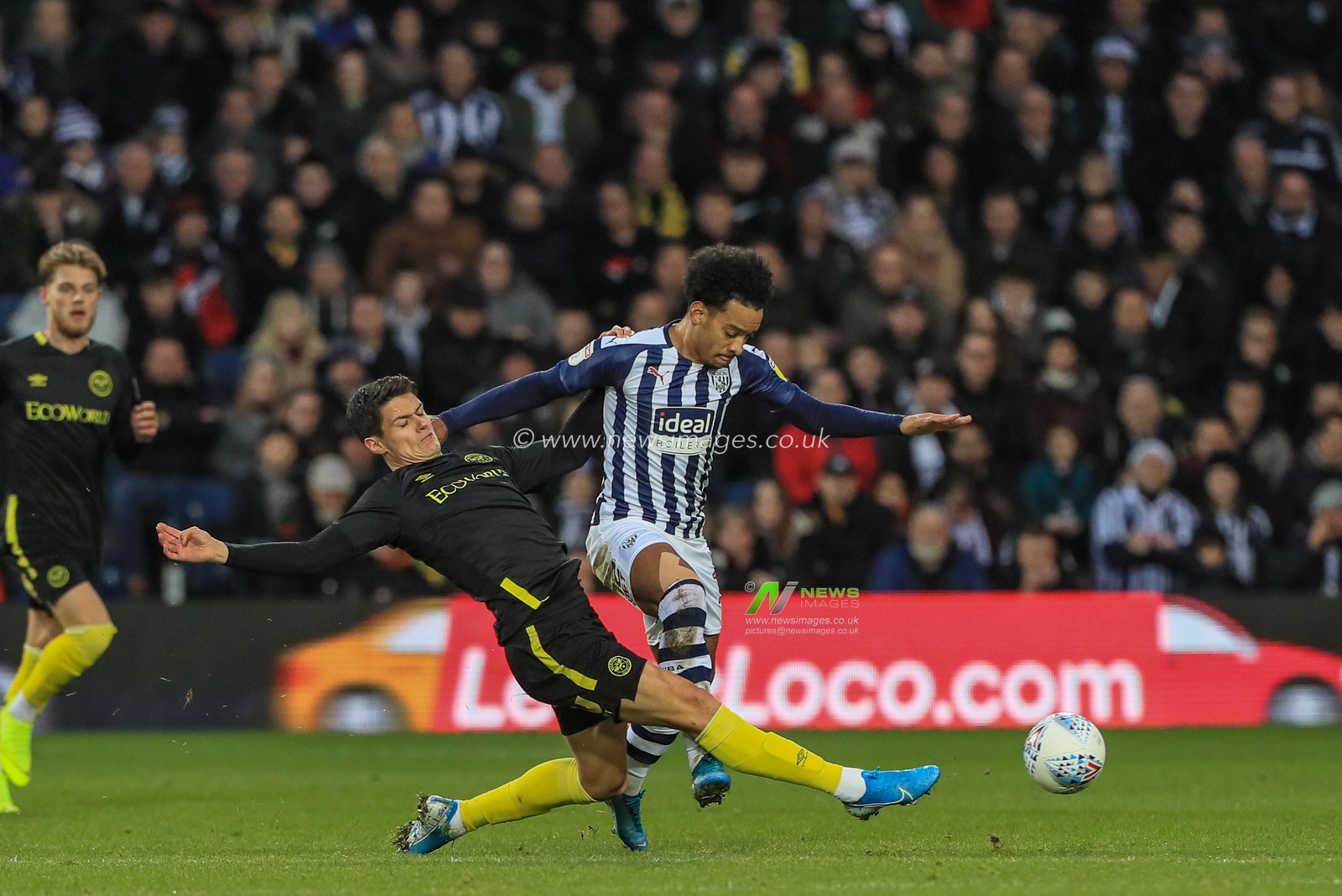 21st December 2019, The Hawthorns, West Bromwich, England; Sky Bet Championship, West Bromwich Albion v Brentford : Christian Norgaard (6) of Brentford tackles Matheus Pereira (12) of West Bromwich Albion  

Credit: Mark Cosgrove/News Images