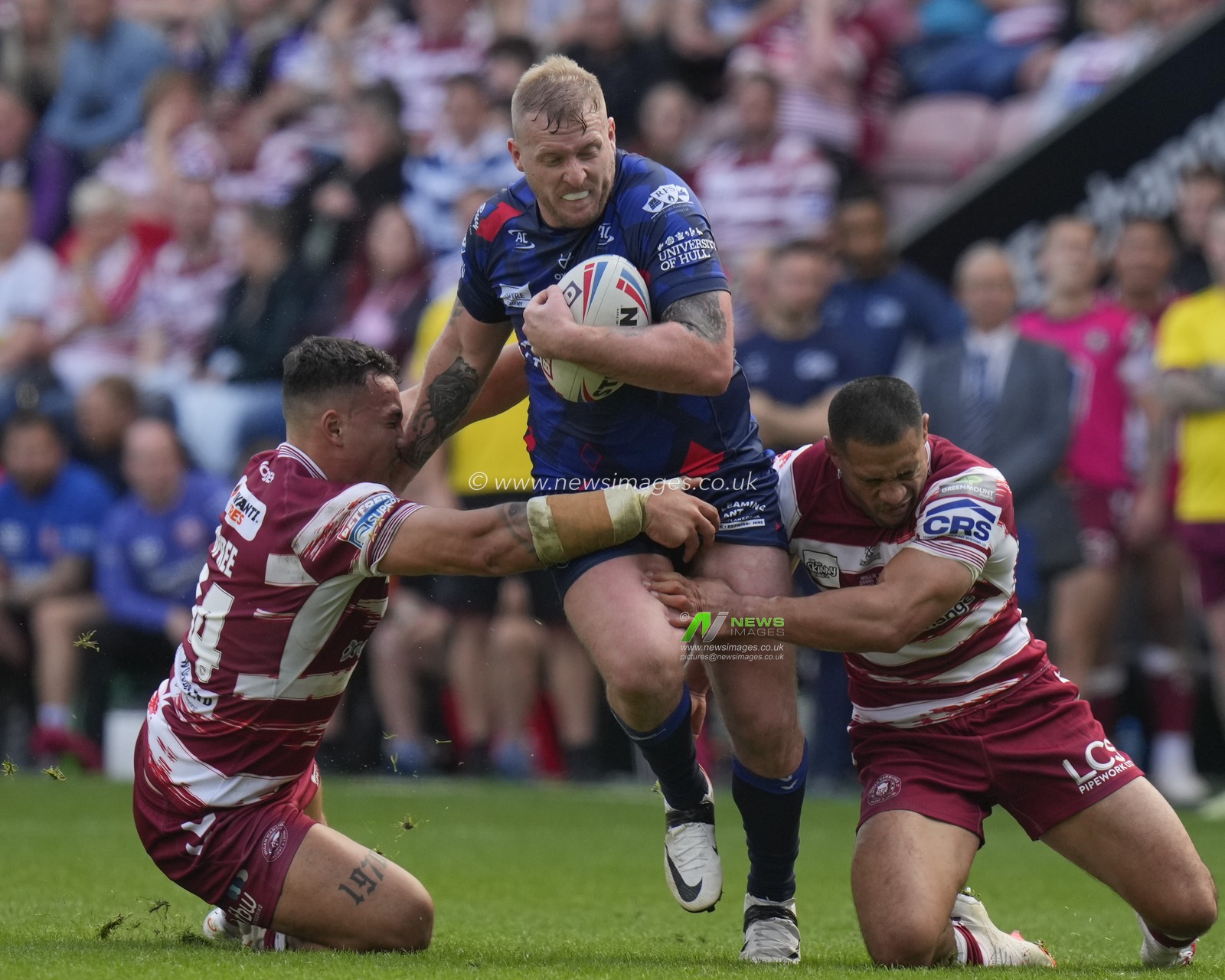 Jordan Abdull #7 of Hull KR  breaks through the Wigan Warriors  defence during the Betfred Super League Semi Final match Wigan Warriors vs Hull KR at DW Stadium, Wigan, United Kingdom, 7th October 2023

(Photo by Steve Flynn/News Images)