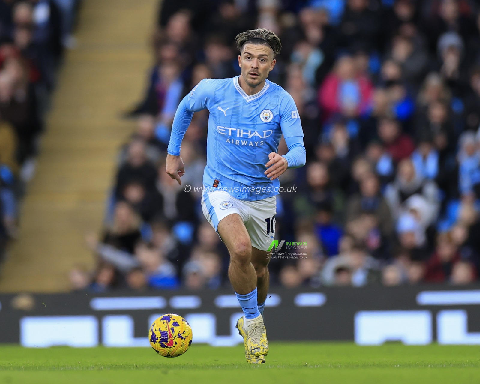 Jack Grealish #10 of Manchester City controls the ball during the Premier League match Manchester City vs Crystal Palace at Etihad Stadium, Manchester, United Kingdom, 16th December 2023

(Photo by Conor Molloy/News Images)