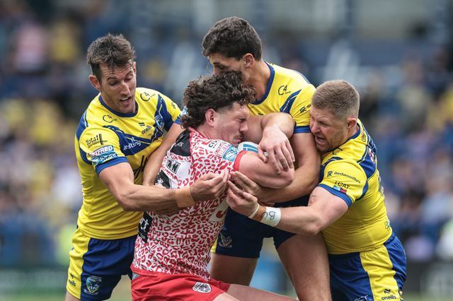 Robbie Mulhern of Leigh Leopards is tackled by Stefan Ratchford, Ryan Matterson during the Betfred Super League Round 25 match Warrington Wolves vs Leigh Leopards at Halliwell Jones Stadium, Warrington, United Kingdom, 6th September 2025

(Photo by Mark Cosgrove/News Images)