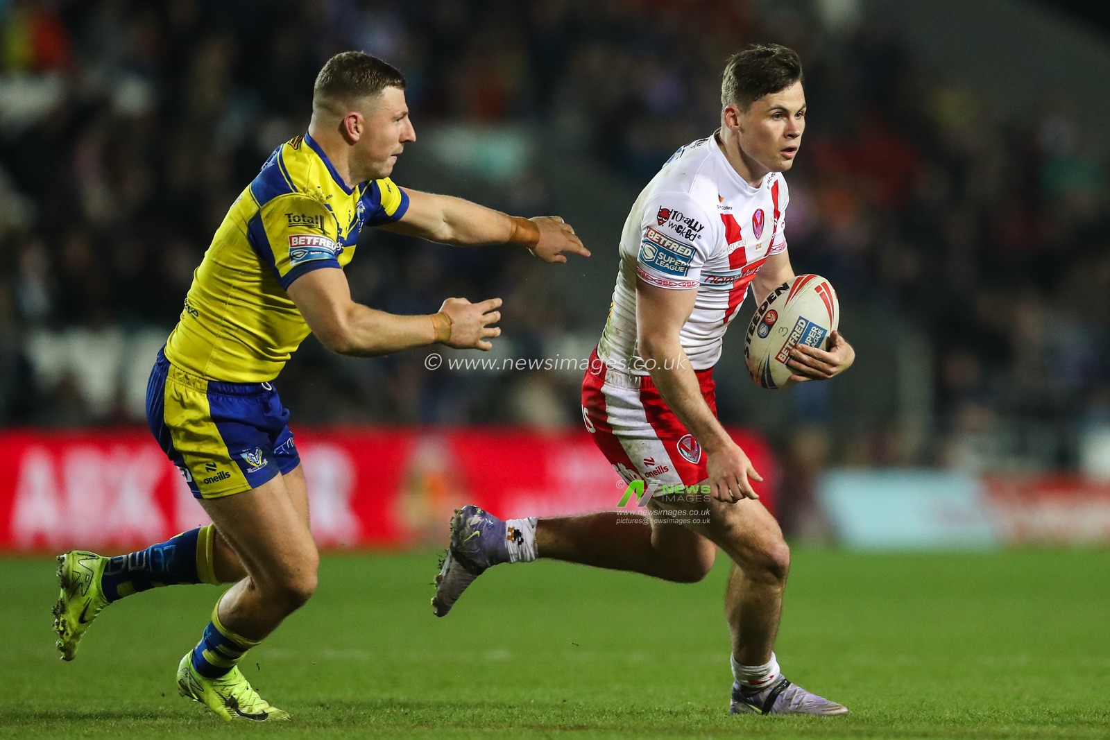 Jack Welsby of St. Helens breaks with the ball during the Betfred Super League Round 5 match St Helens vs Warrington Wolves at Totally Wicked Stadium, St Helens, United Kingdom, 21st March 2025

(Photo by Gareth Evans/News Images)