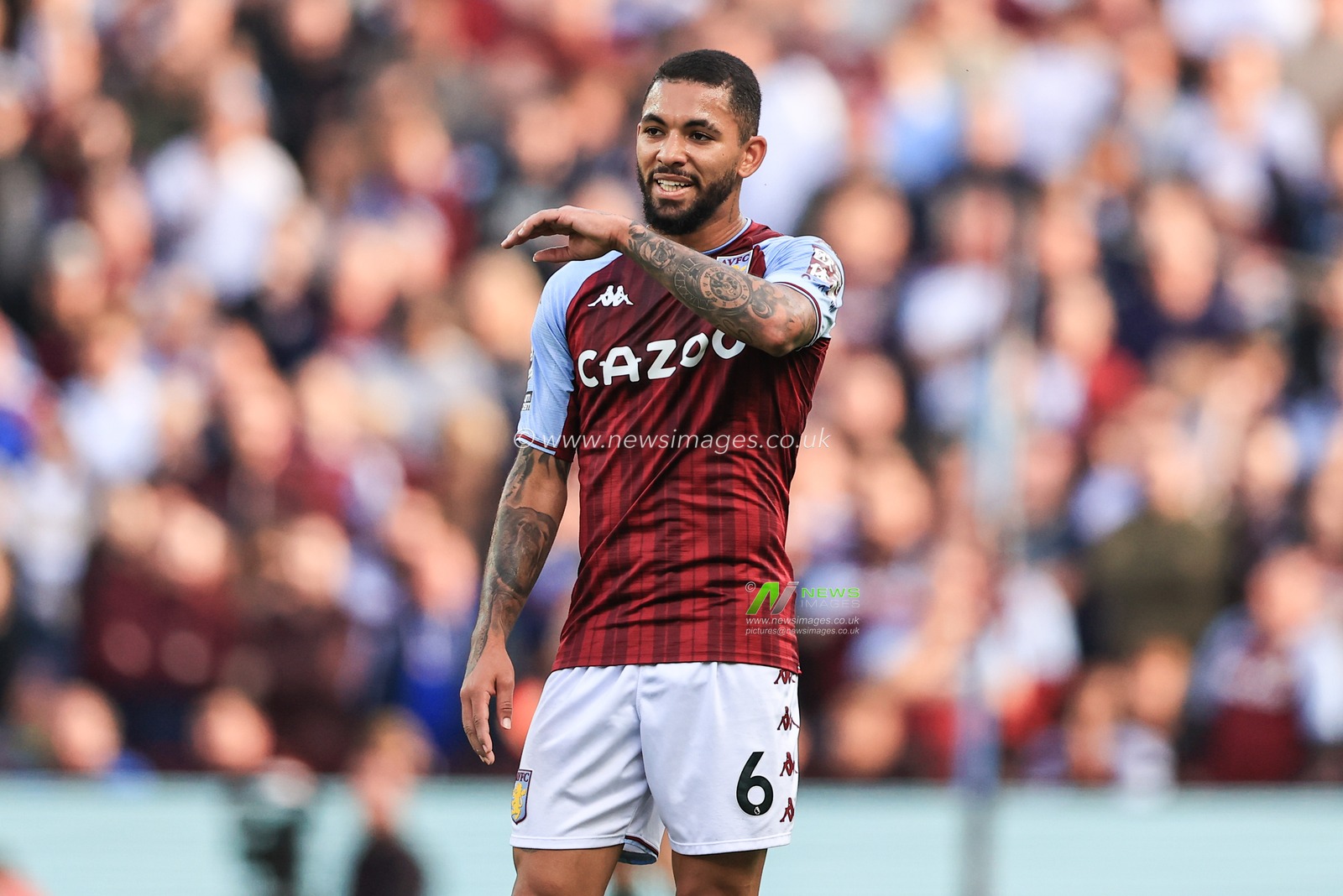 Douglas Luiz #6 of Aston Villa during the game