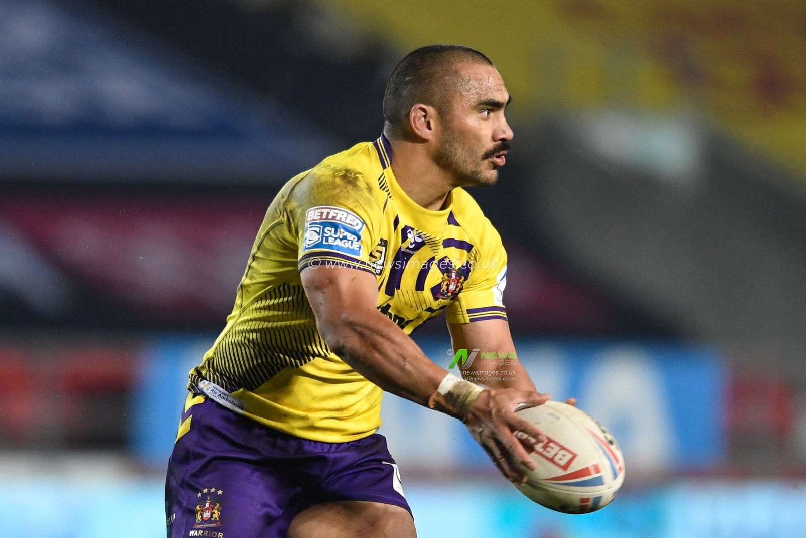 Thomas Leuluai (7) of Wigan Warriors with the ball