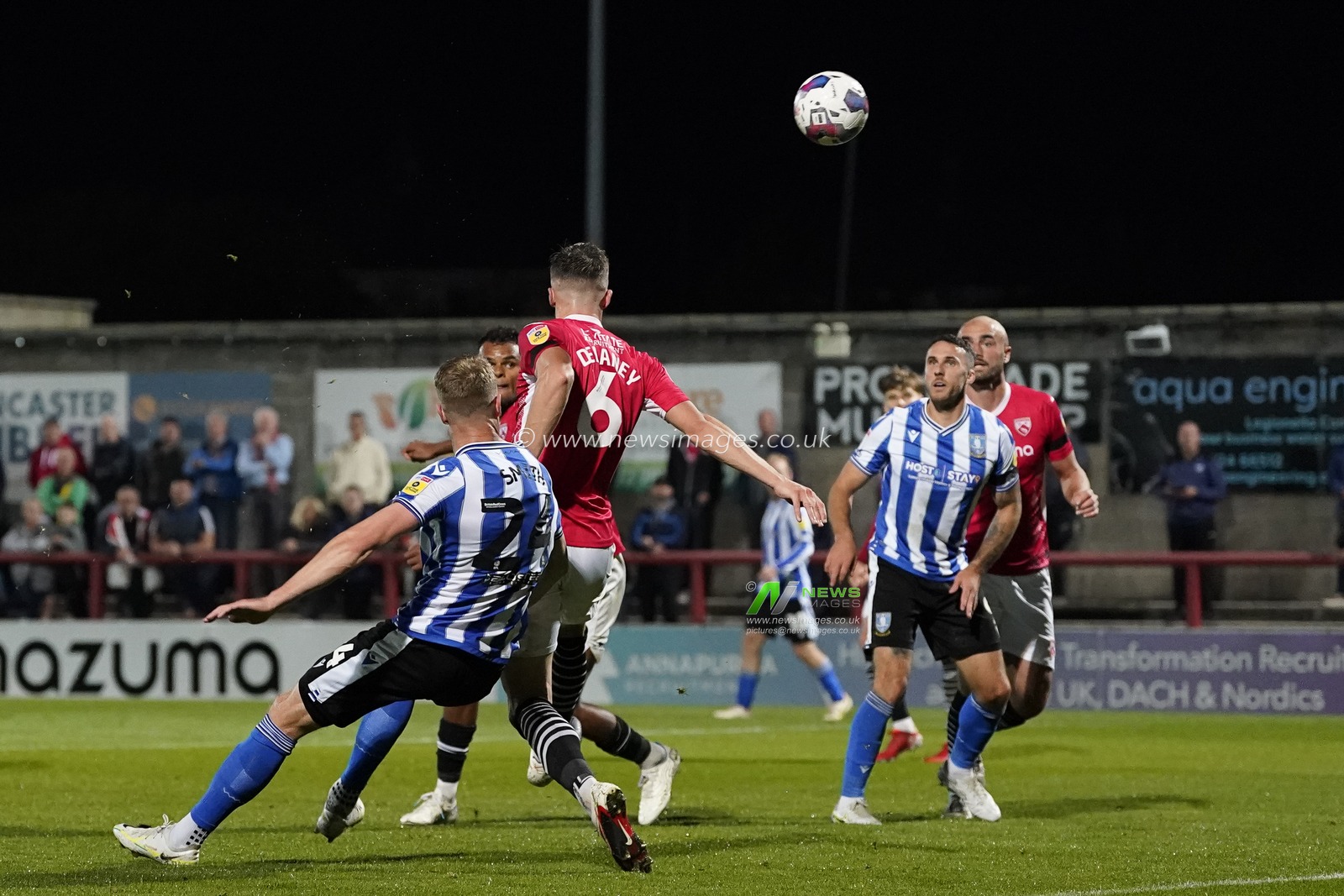 Michael Smith of Sheffield Wednesday flicks the ball on to Lee Gregory during the Sky Bet League 1 match Morecambe vs Sheffield Wednesday at Mazuma Stadium, Morecambe, United Kingdom, 13th September 2022

(Photo by Steve Flynn/News Images)