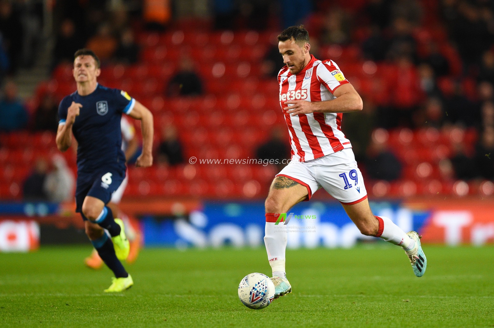 1st October 2019, Bet365 Stadium, Stoke-on-Trent, England; Sky Bet Championship, Stoke City v Huddersfield Town : Lee Gregory (19) of Stoke City runs the ball on goal

Credit: Richard Long/News Images