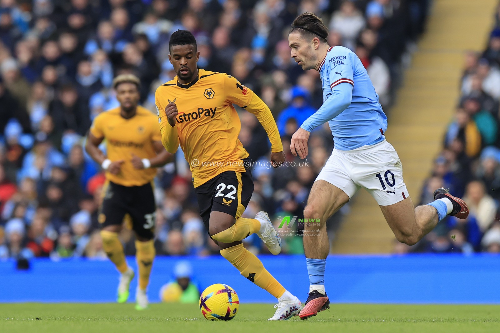 Jack Grealish #10 of Manchester City runs past Nelson Semedo #22 of Wolverhampton Wanderers during the Premier League match Manchester City vs Wolverhampton Wanderers at Etihad Stadium, Manchester, United Kingdom, 22nd January 2023

(Photo by Conor Molloy/News Images)