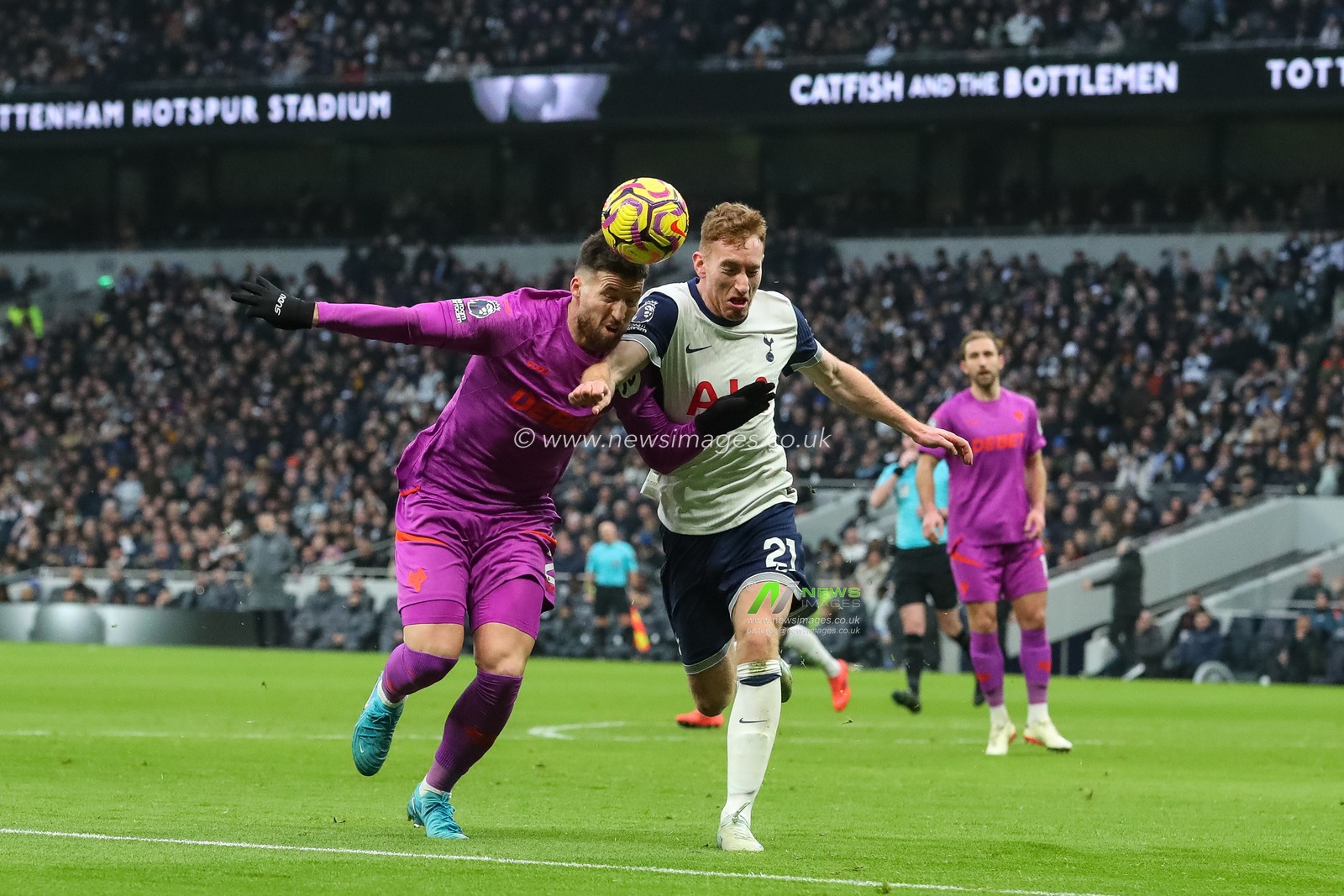 Matt Doherty of Wolverhampton Wanderers and Dejan Kulusevski of Tottenham Hotspur battle for the ball during the Premier League match Tottenham Hotspur vs Wolverhampton Wanderers at Tottenham Hotspur Stadium, London, United Kingdom, 29th December 2024

(Photo by Izzy Poles/News Images)
