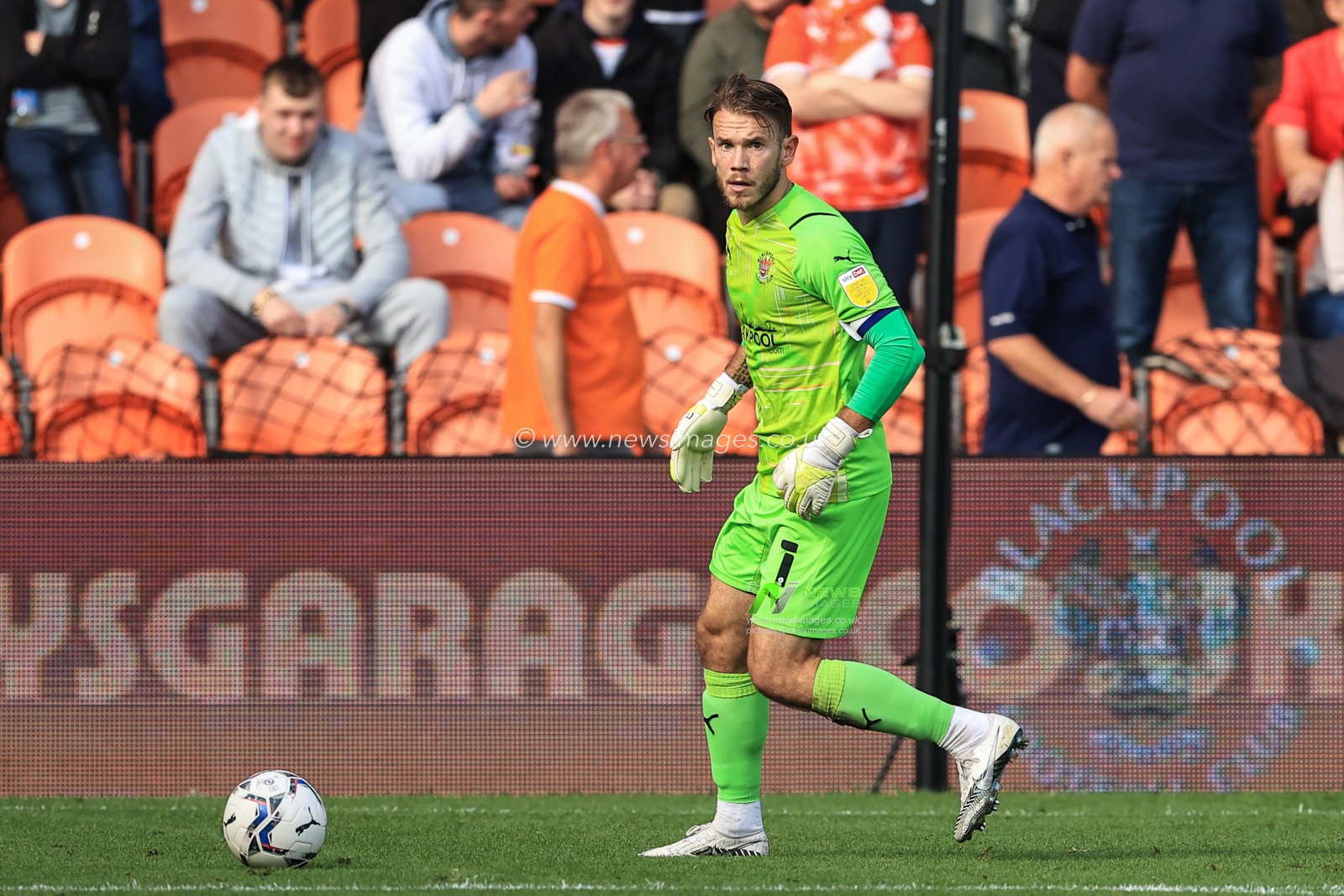 Chris Maxwell #1 of Blackpool in action during the game