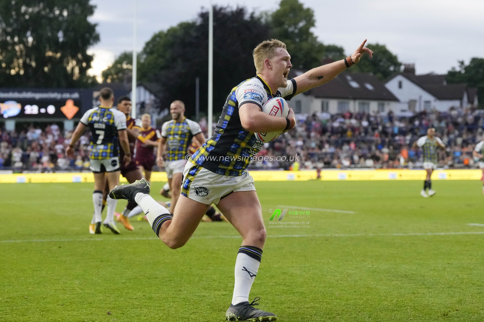 James McDonnell #19 of Leeds Rhinos celebrates as he runs in a try during the Betfred Super League Round 16 match Leeds Rhinos vs Huddersfield Giants at Headingley Stadium, Leeds, United Kingdom, 23rd June 2023

(Photo by Steve Flynn/News Images)