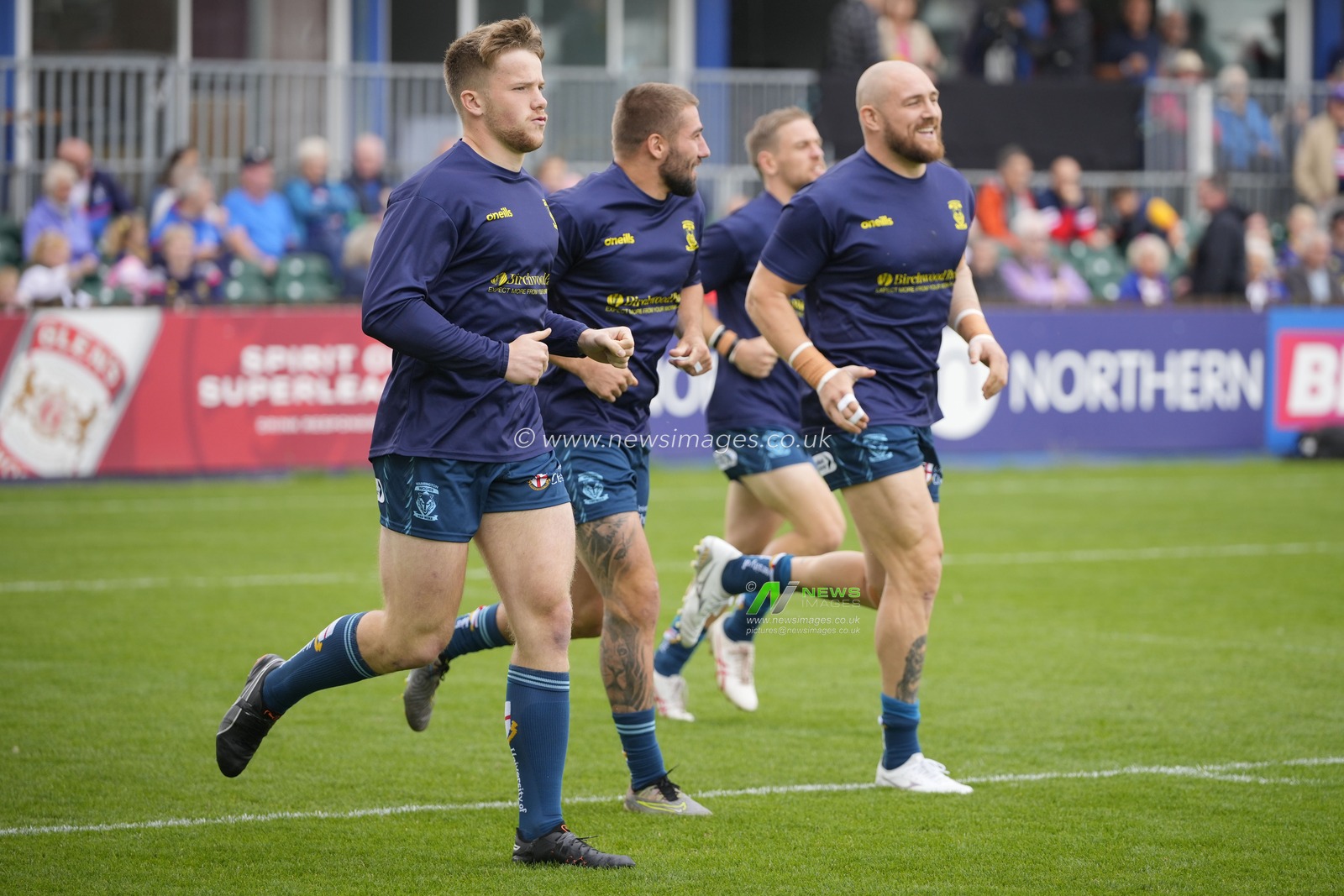 Warrington Wolves players run out for the warm up before the Betfred Super League Round 20 match Wakefield Trinity vs Warrington Wolves at The Be Well Support Stadium, Wakefield, United Kingdom, 30th July 2023

(Photo by Steve Flynn/News Images)