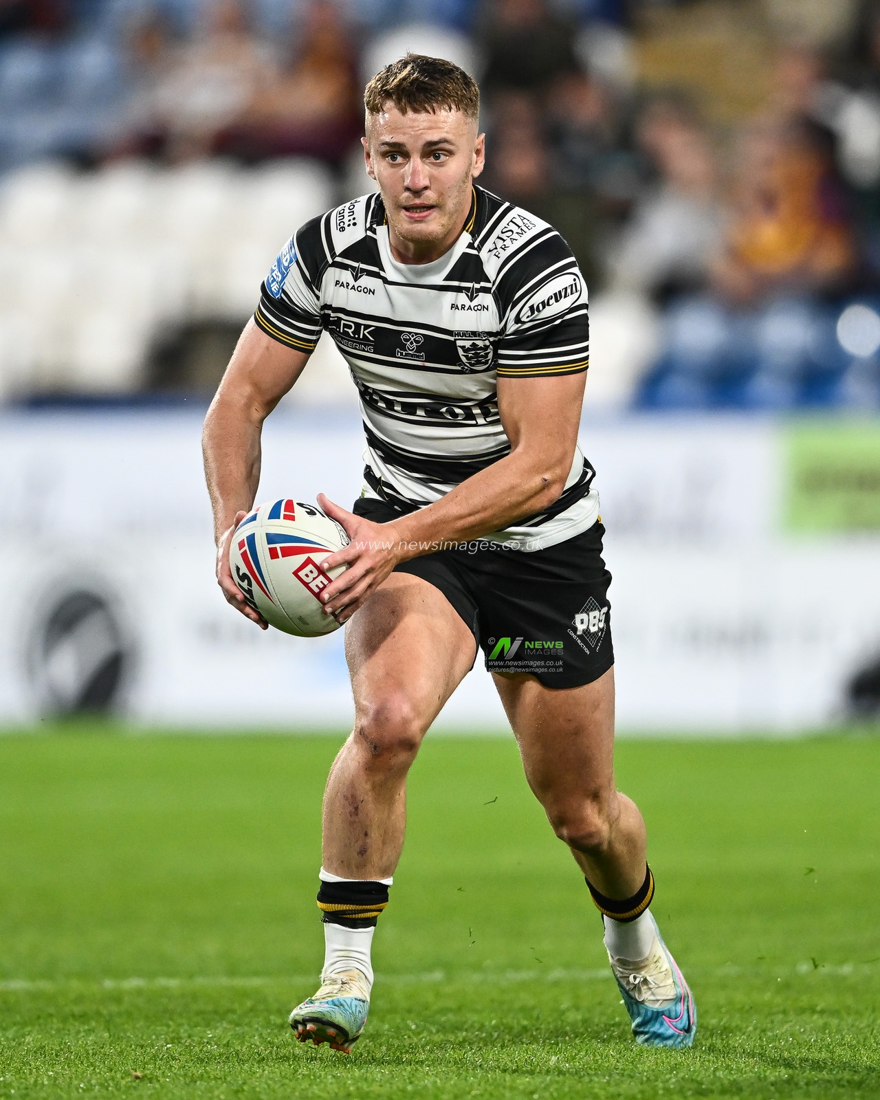 Jake Trueman #6 of Hull FC makes a break during the Betfred Super League Round 20 match Huddersfield Giants vs Hull FC at John Smith's Stadium, Huddersfield, United Kingdom, 27th July 2023

(Photo by Craig Thomas/News Images)