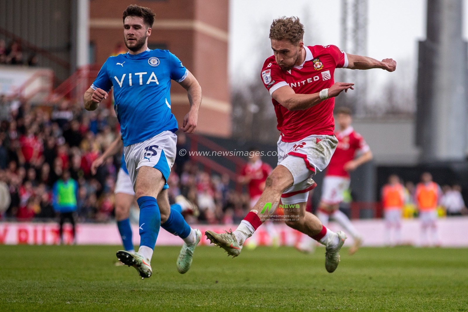 Wrexham's Sam Smith  shoots towards goal during the Sky Bet League 1 match Wrexham vs Stockport County at SToK Cae Ras, Wrexham, United Kingdom, 22nd March 2025

(Photo by Nik Mesney/News Images)