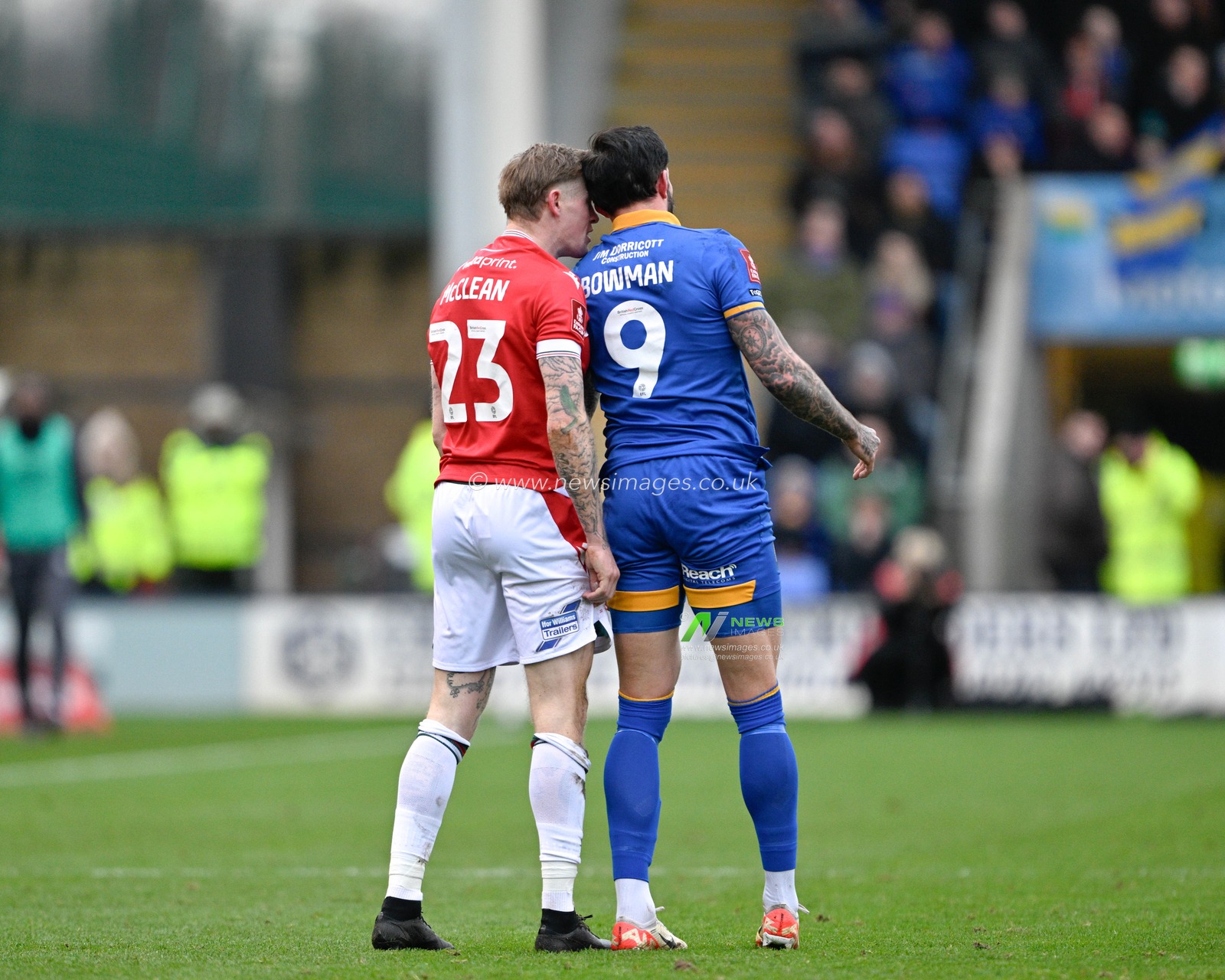 James McClean of Wrexham and Ryan Bowman of Shrewsbury Town clash, during the Emirates FA Cup Third Round match Shrewsbury Town vs Wrexham at Croud Meadow, Shrewsbury, United Kingdom, 7th January 2024

(Photo by Cody Froggatt/News Images)