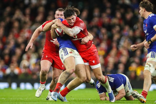Louis Rees-Zammit of Wales is tackled during the Guinness Six Nations match Wales vs France at Principality Stadium, Cardiff, United Kingdom, 15th February 2026

(Photo by Andrew Lewis/News Images)