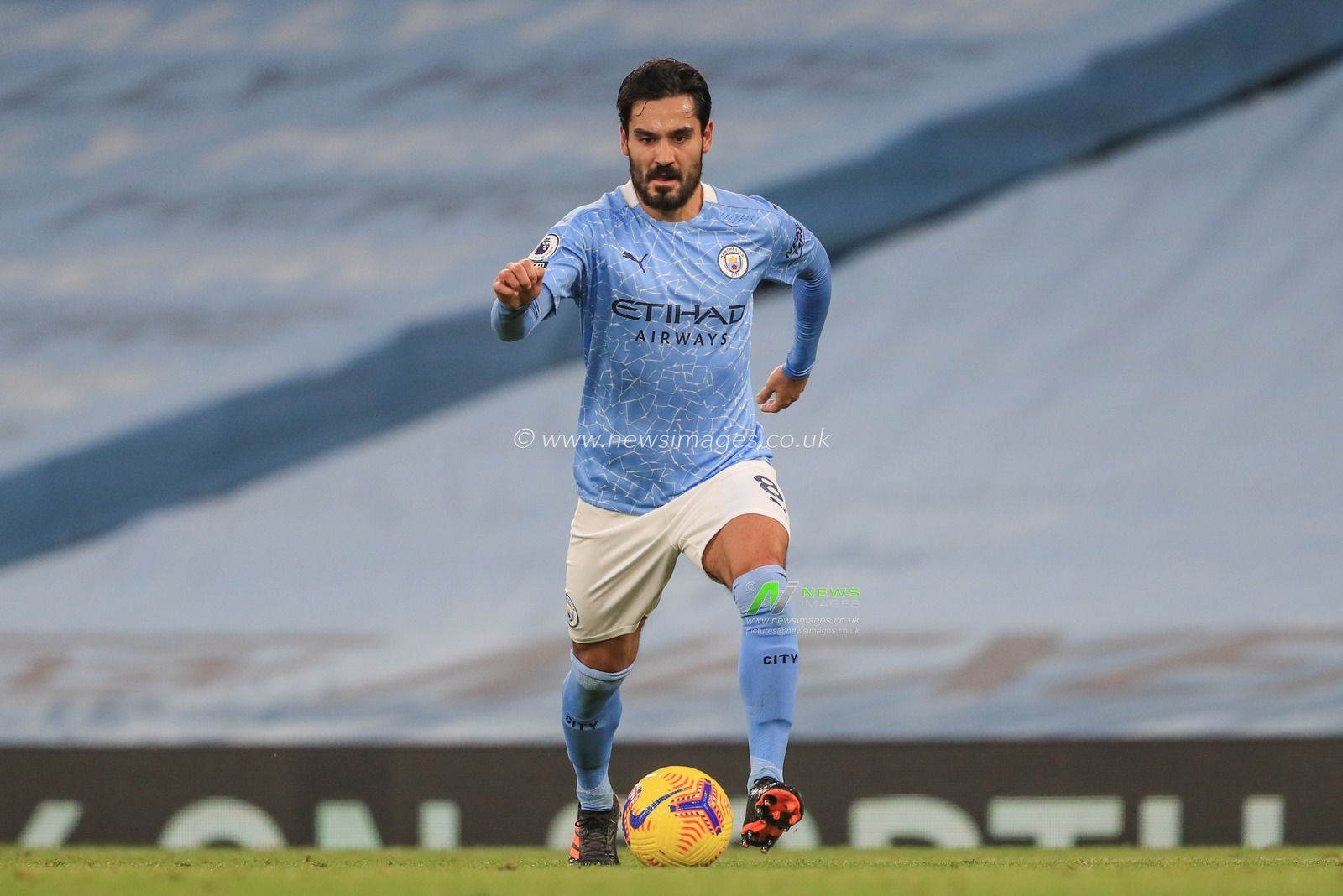 Ilkay Gundogan #8 of Manchester City in action during the game