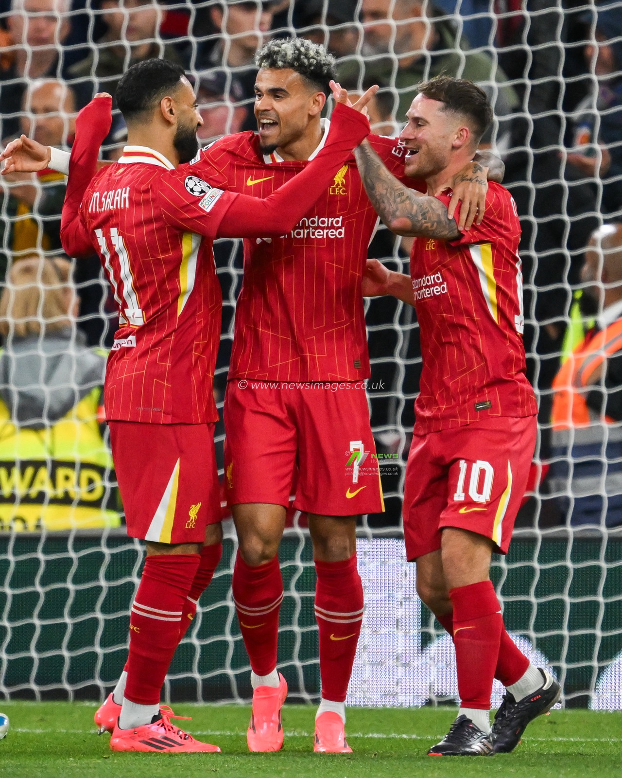 Alexis Mac Allister of Liverpool celebrates his goal with teammates to make 1-0 during the UEFA Champions League  - League Stage match Liverpool vs Bologna at Anfield, Liverpool, United Kingdom, 2nd October 2024

(Photo by Craig Thomas/News Images)