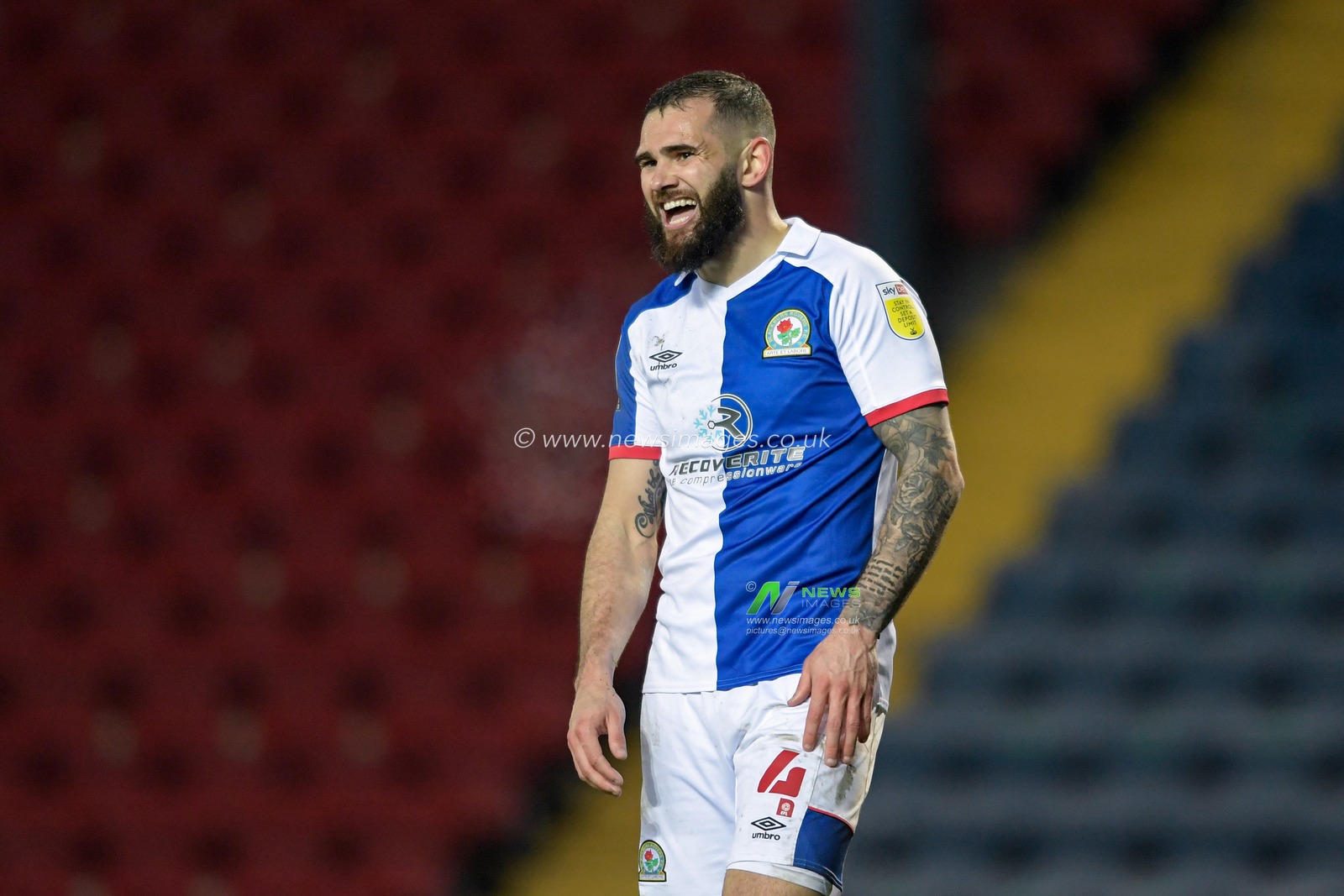 Bradley Johnson #4 of Blackburn Rovers laughs during the game