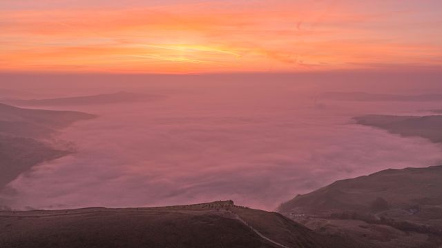 Sunrise hikers walk to the summit of Mam Tor as they watch the sunrise and admire the cloud inversion in the Hope Valley at Mam Tor in the Peak District at Mam Tor, Castleton, United Kingdom on 21 March 2026

(Photo by Mark Cosgrove/News Images)