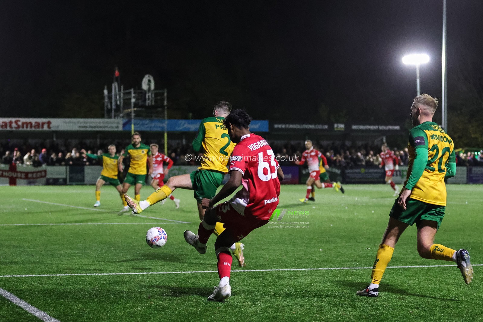Vimal Yoganathan #63 of Barnsley crosses the ball during the Emirates FA Cup match Horsham FC vs Barnsley at The Camping World Community Stadium, Horsham, United Kingdom, 14th November 2023

(Photo by Mark Cosgrove/News Images)