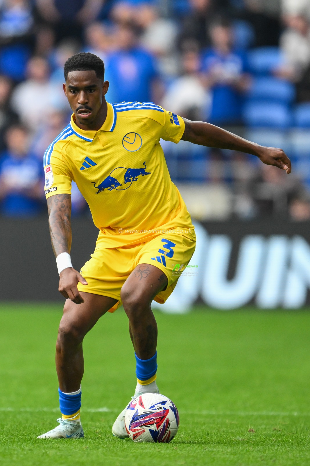 JÃºnior Firpo of Leeds United makes a break with the ball  during the Sky Bet Championship match Cardiff City vs Leeds United at Cardiff City Stadium, Cardiff, United Kingdom, 21st September 2024

(Photo by Craig Thomas/News Images)