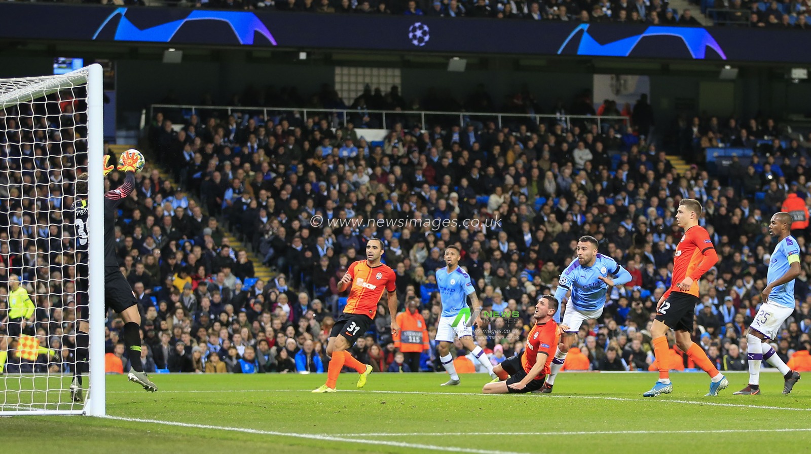 26th November 2019, Etihad Stadium, Manchester, England; UEFA Champions League, Manchester City v FC Shakhtar Donetsk : Nicolas Otamendi (30) of Manchester City sees his header on goal saved by Andriy Pyatov (30) of Shakhtar Donetsk

Credit: Conor Molloy/News Images