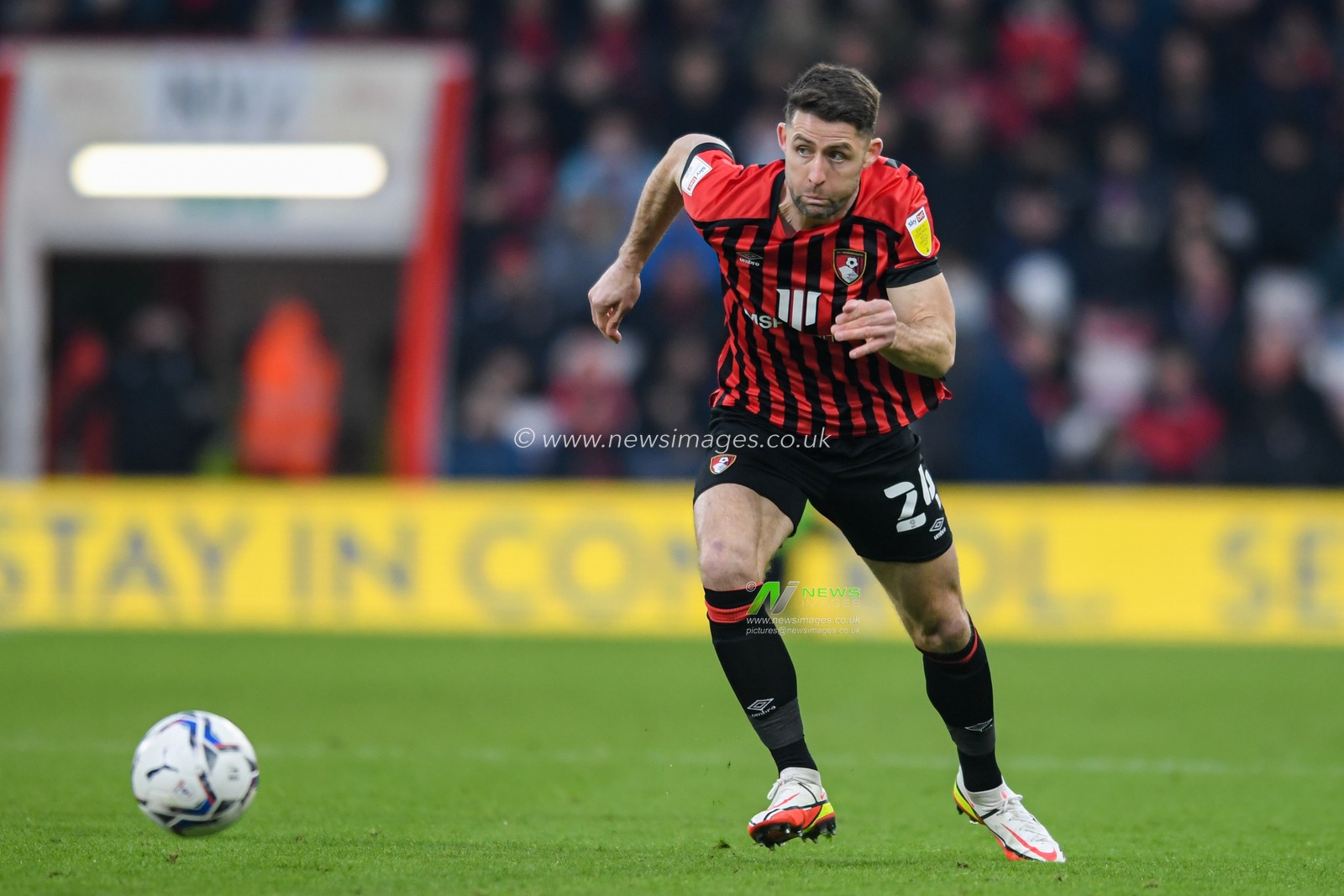 Gary Cahill #24 of Bournemouth runs forward with the ball